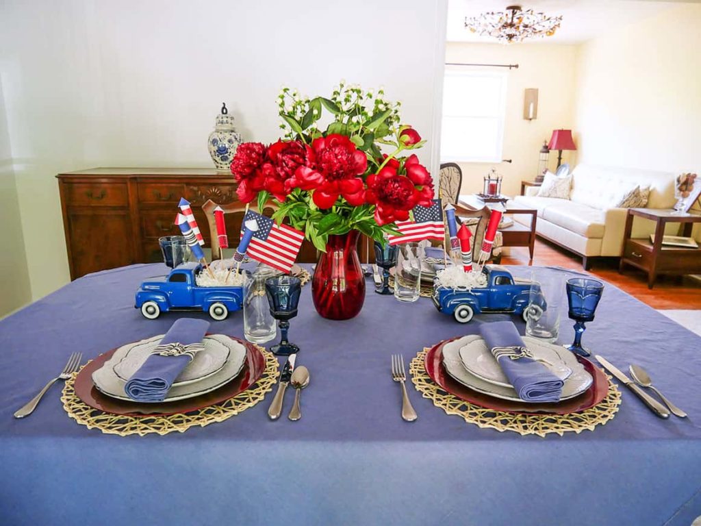 Place settings added to patriotic 4th of July table setting