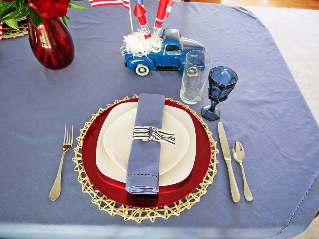 White plate on festive 4th of July tablescape