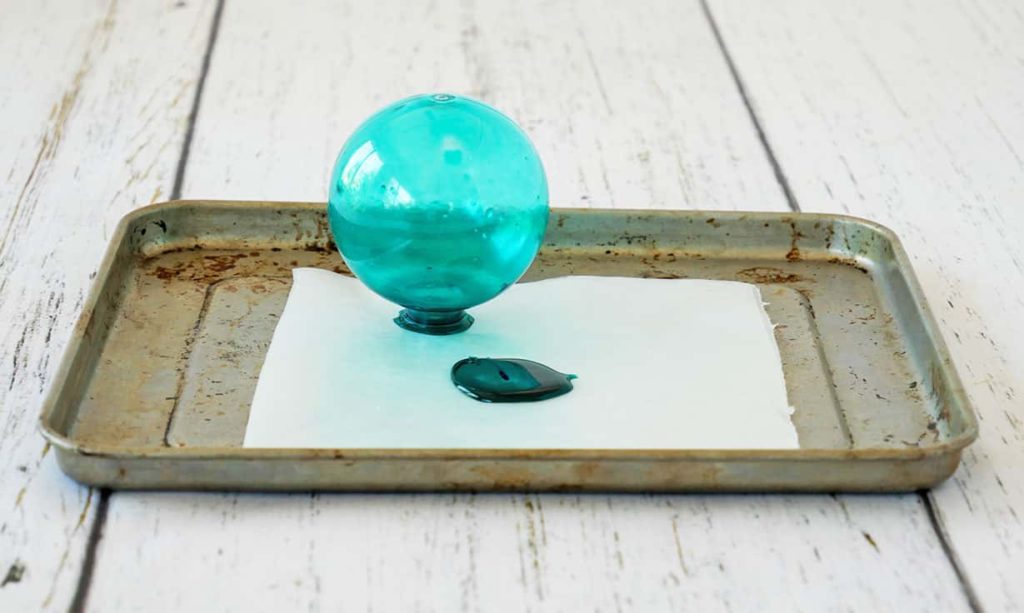 Glass fishing float diy moved on wax paper