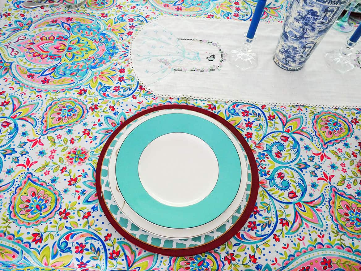 Teal and white plate on top
