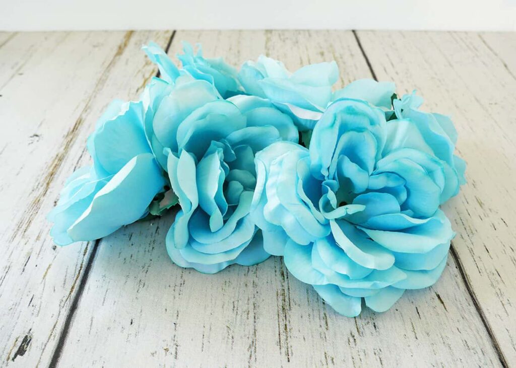 Bunch of dyed blue fake flowers