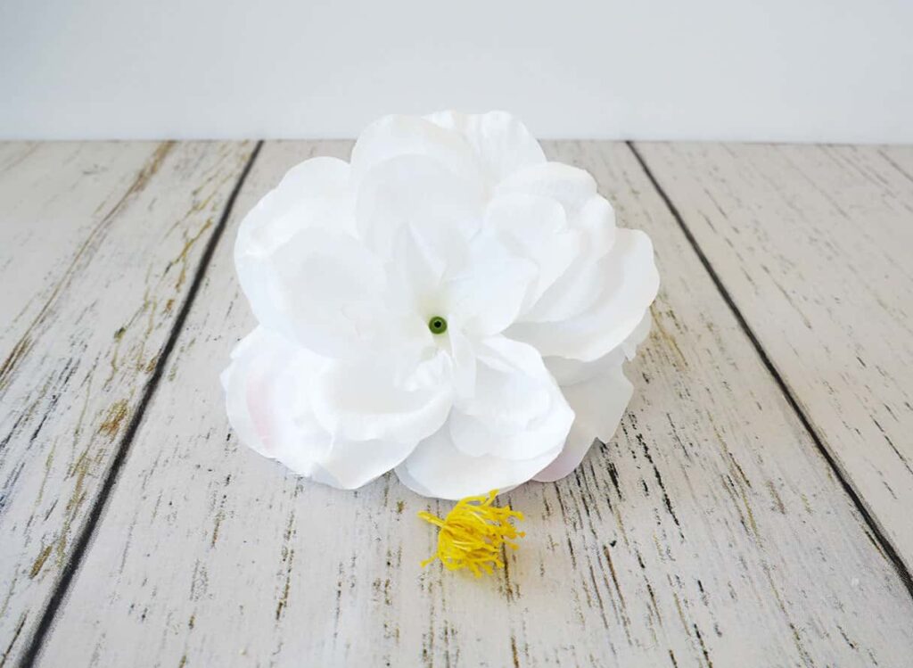 Middle removed from white fake flower