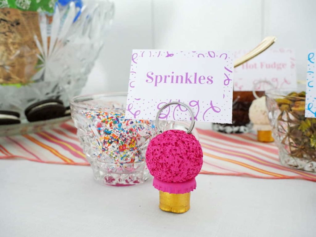 DIY ice cream place card holders on table