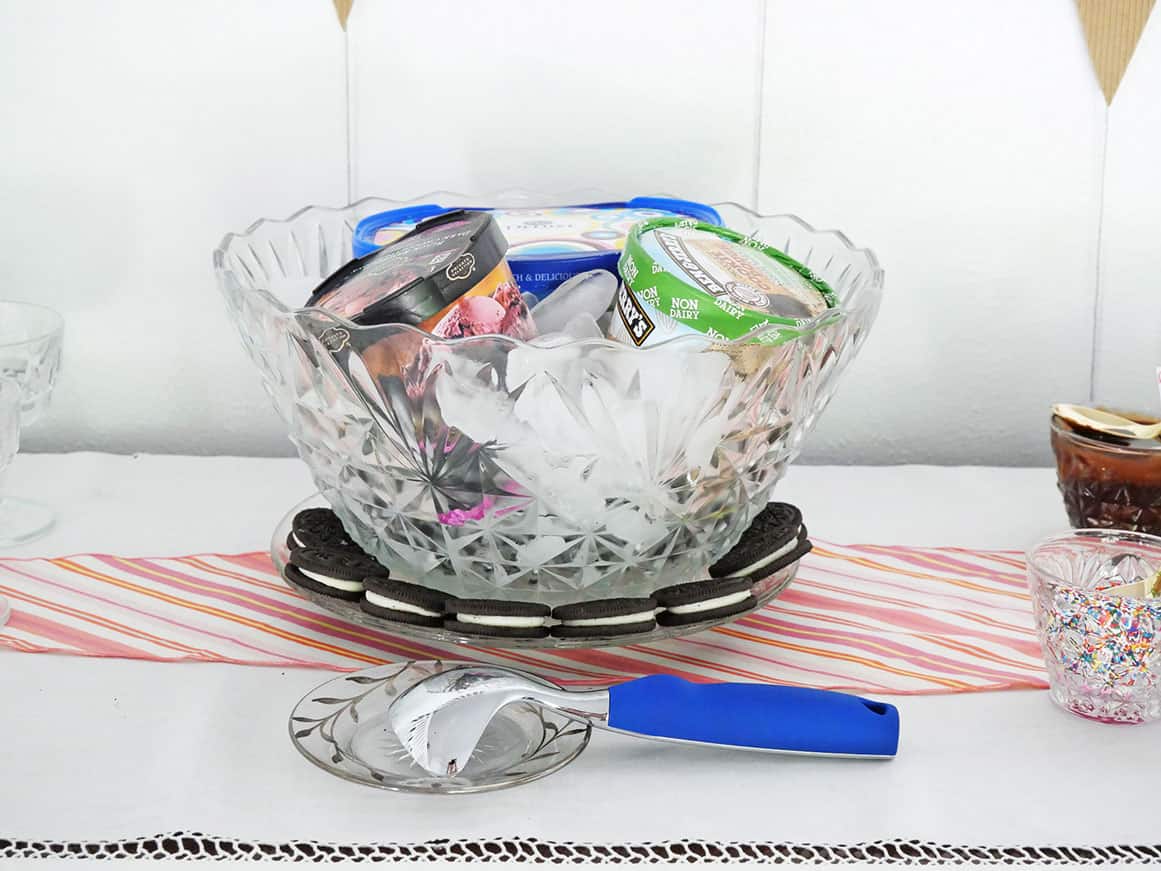 Punch bowl filled with ice and ice cream
