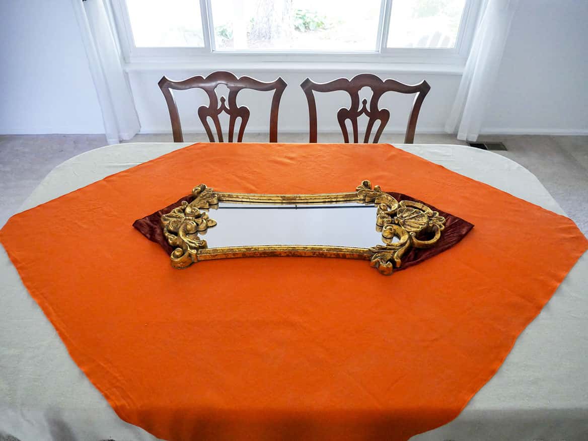 Mirror used as centerpiece on 1970s vintage fall tablescape