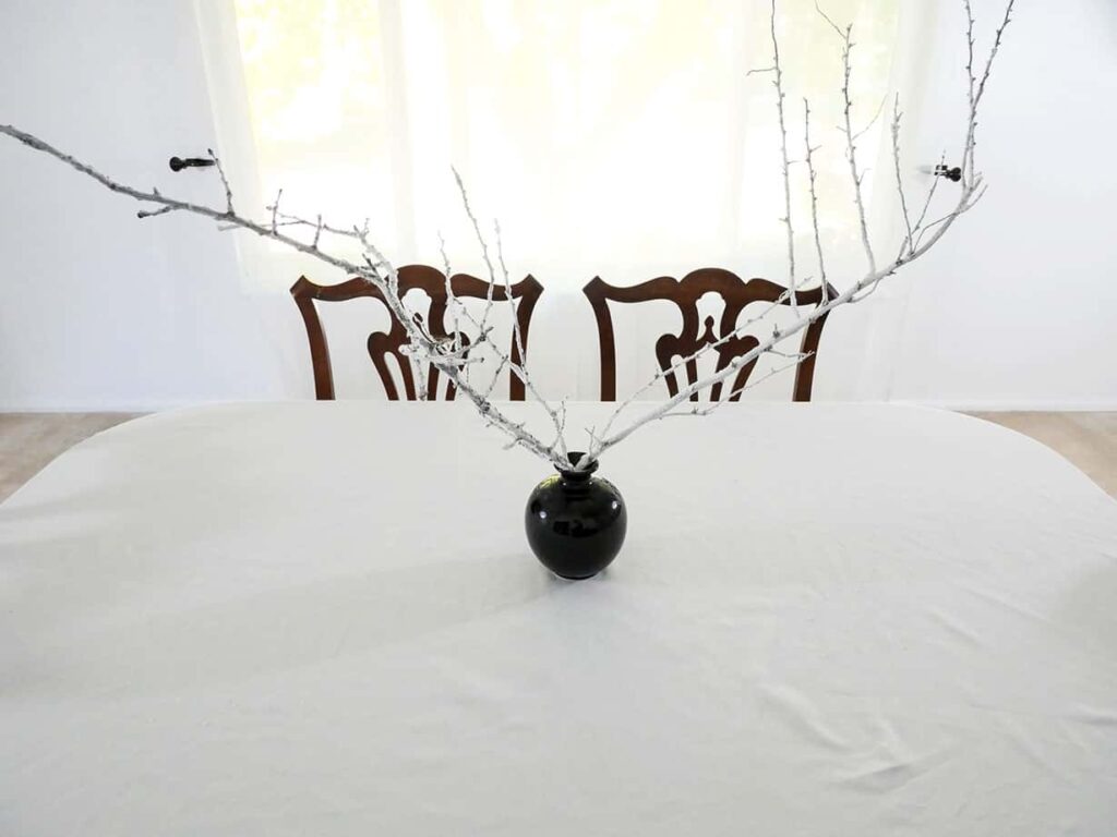 Spider Halloween table setting with black vase