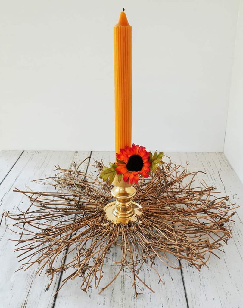 Flower added around candle