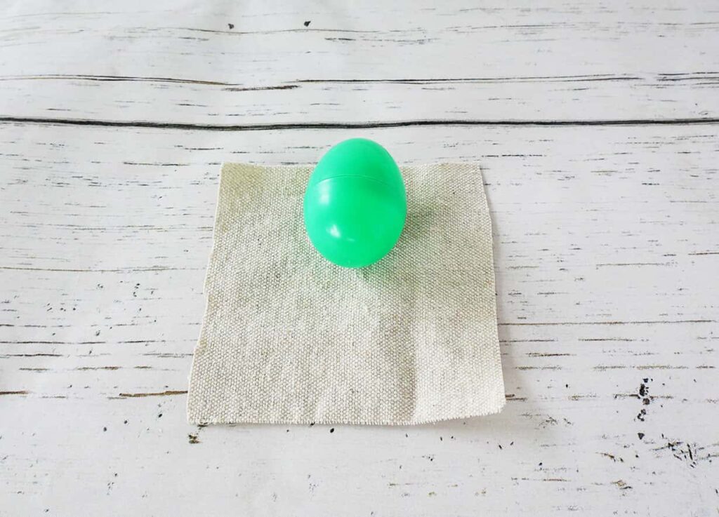 Egg on fabric square