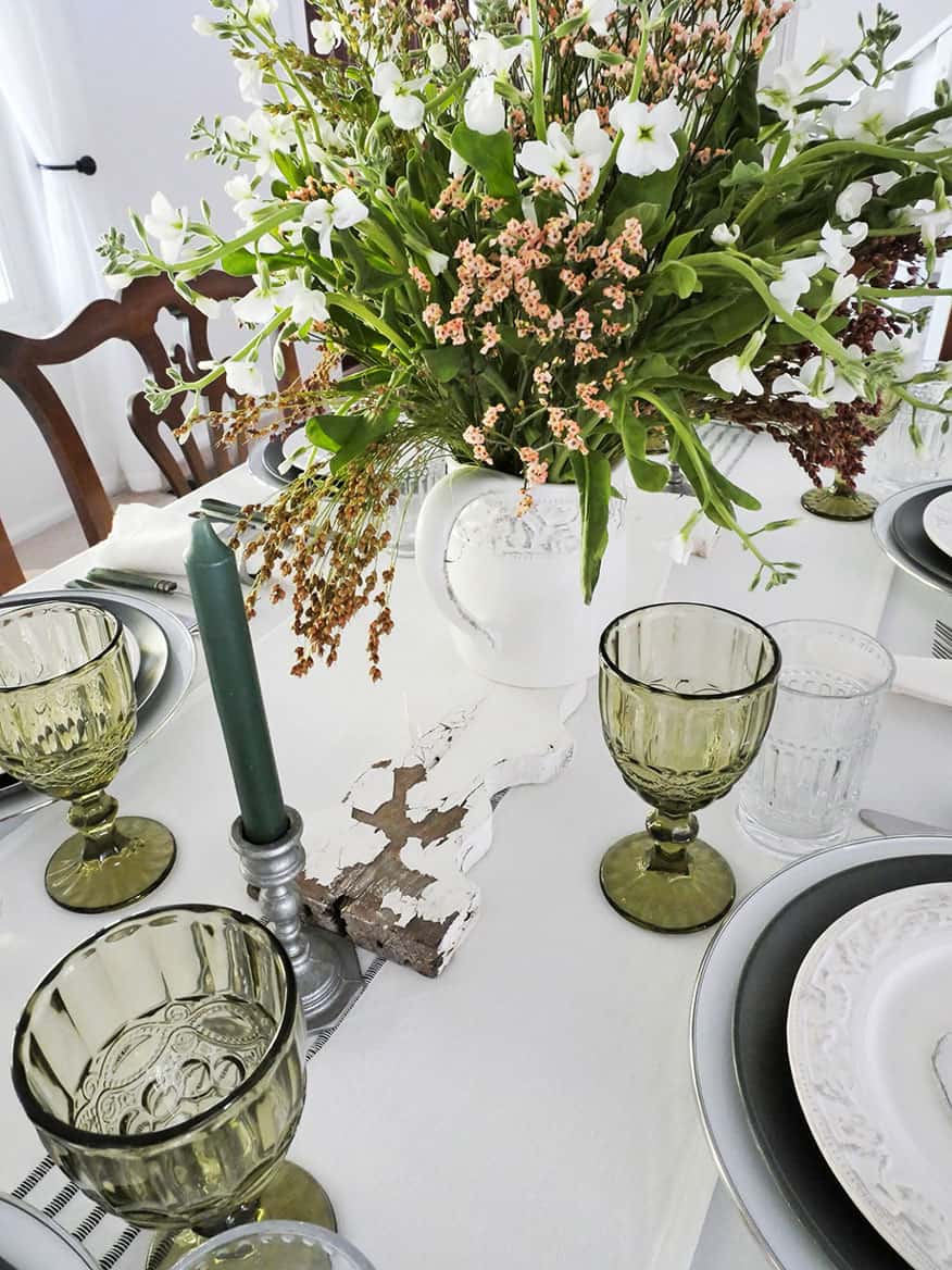 Angled view of centerpiece on French farmhouse Friendsgiving tablescape