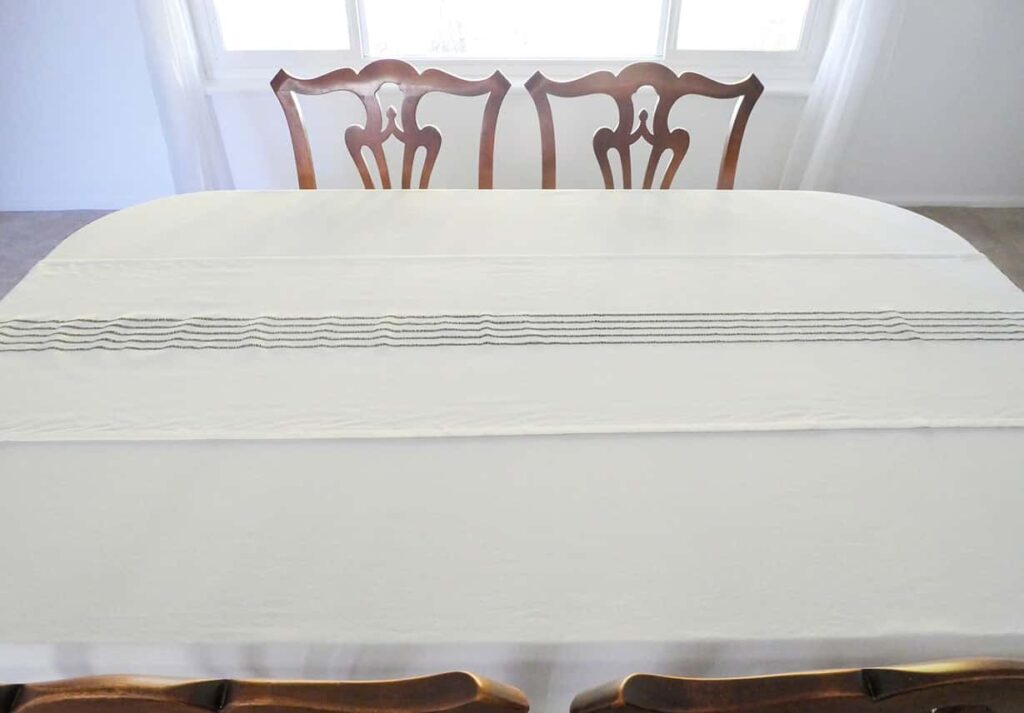 Table runner over white tablecloth