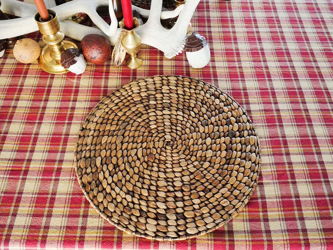 Rattan charger plate on tablecloth
