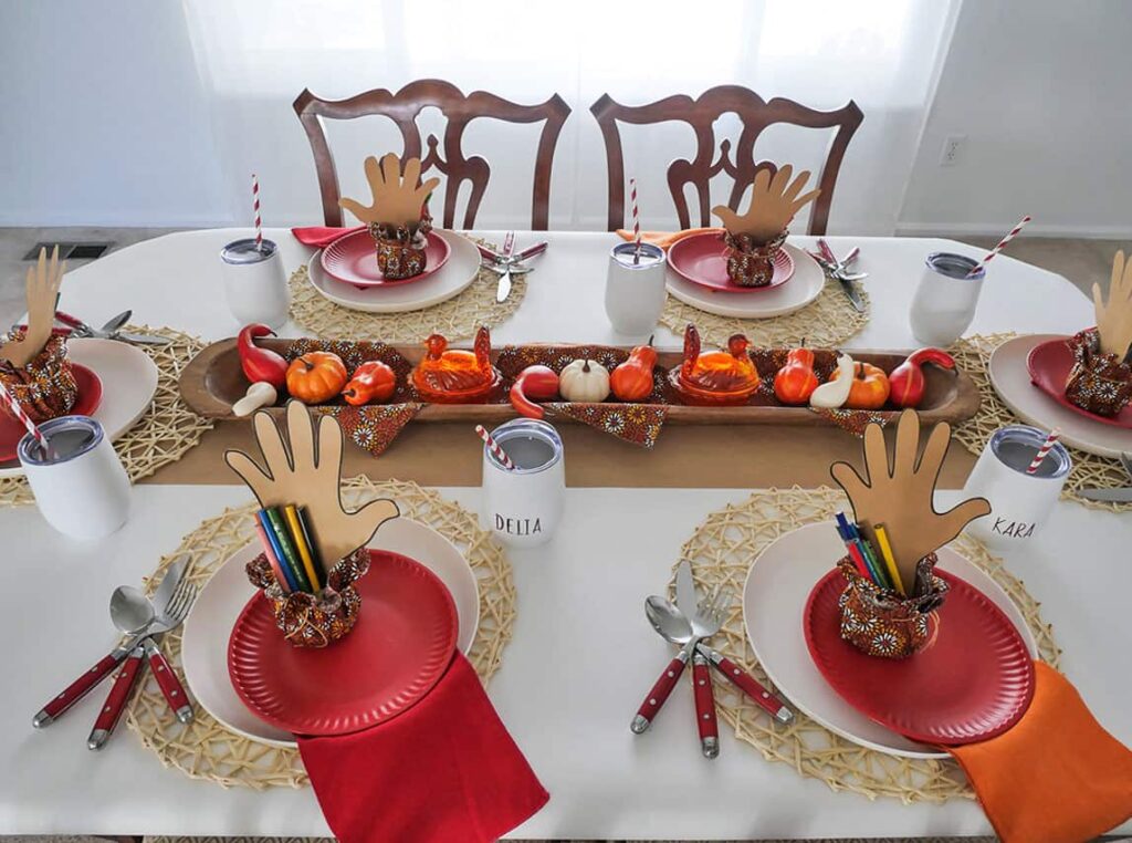 Side view of kids Thanksgiving day table