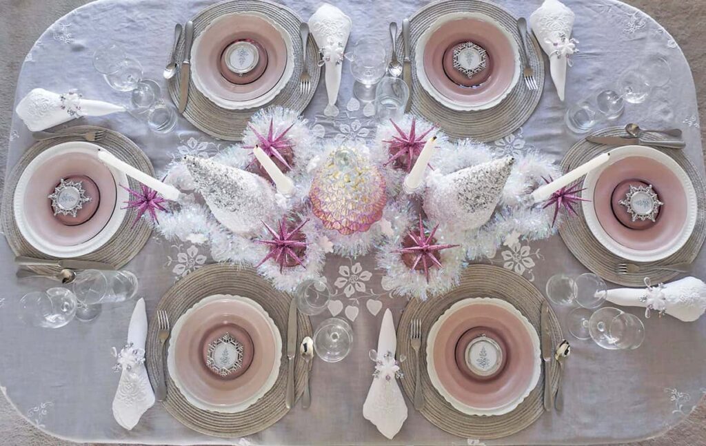 Overhead view of pretty Christmas table setting