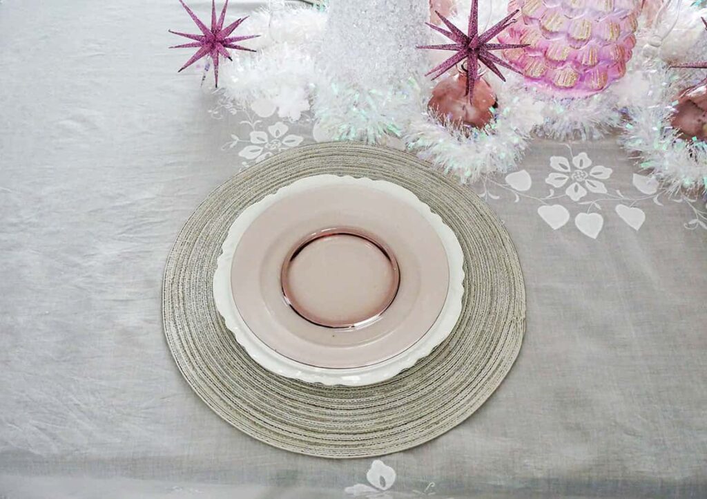 Transparent lilac plate added to pretty Christmas table setting