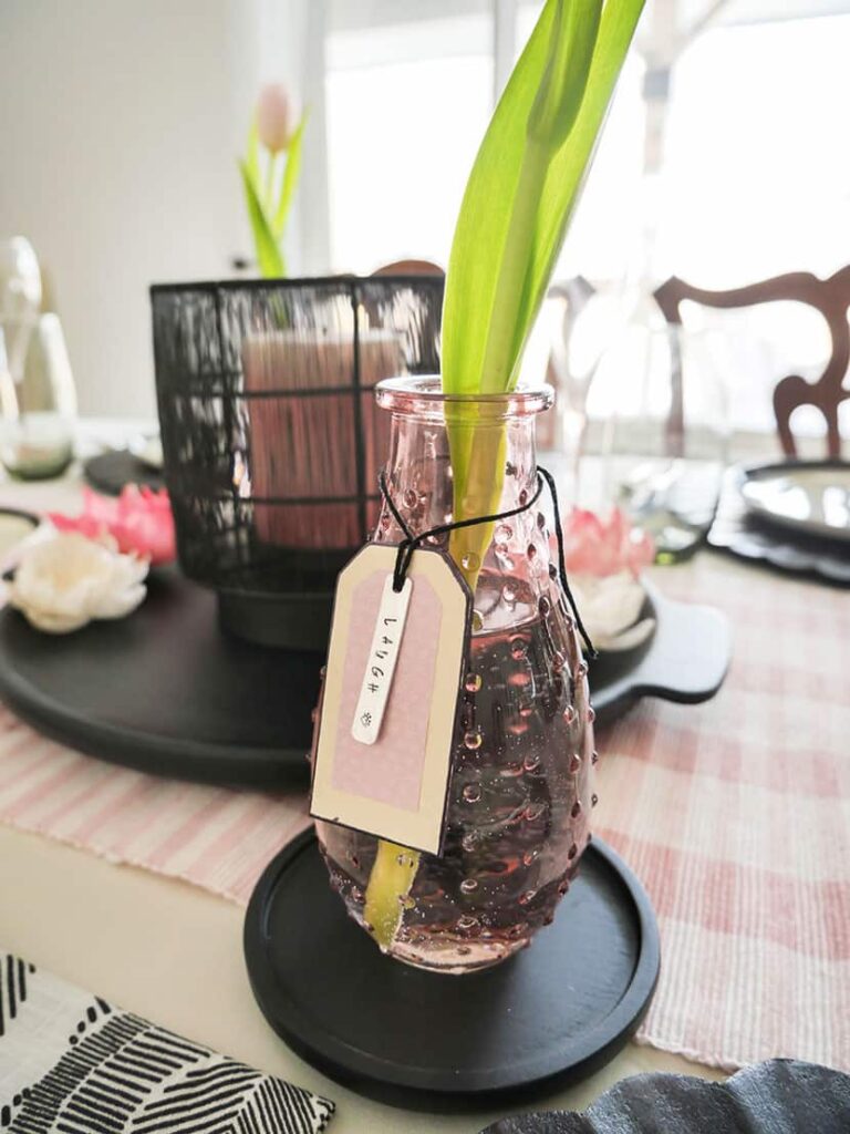 Vase with cute tag added to place setting