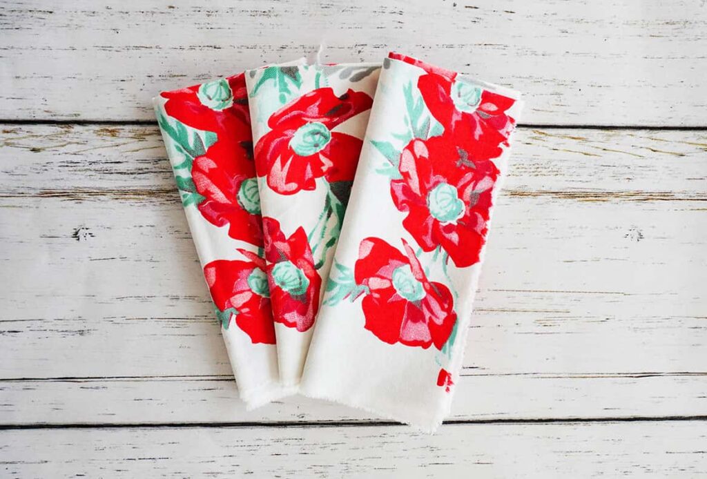 Red flower napkins from stained tablecloth