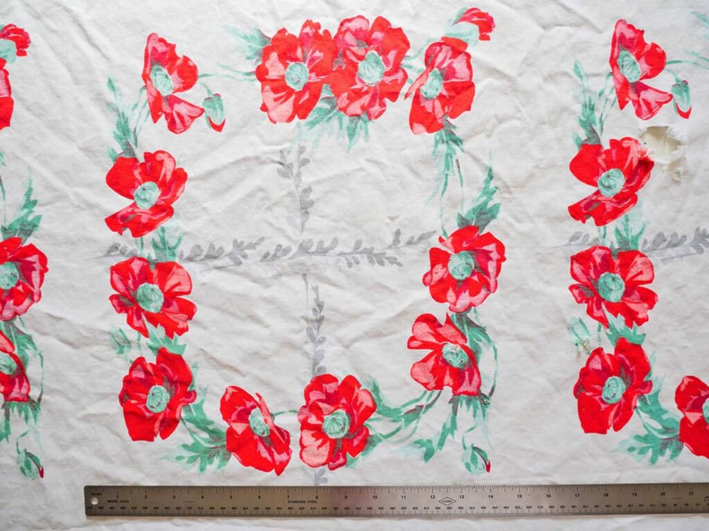 Measure upcycle tablecloth into napkins