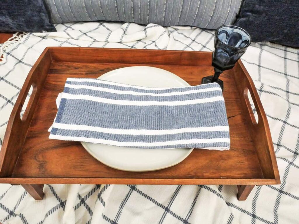 Blue and white dish towel added to plate