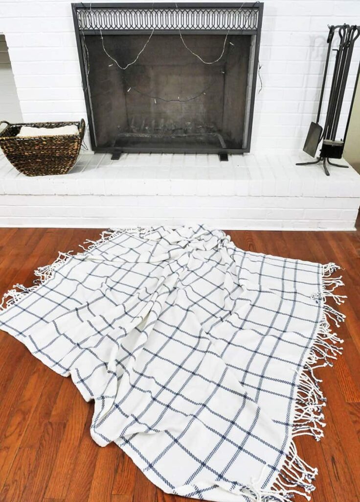 Throw blanket on floor used for easy cozy table setting for two