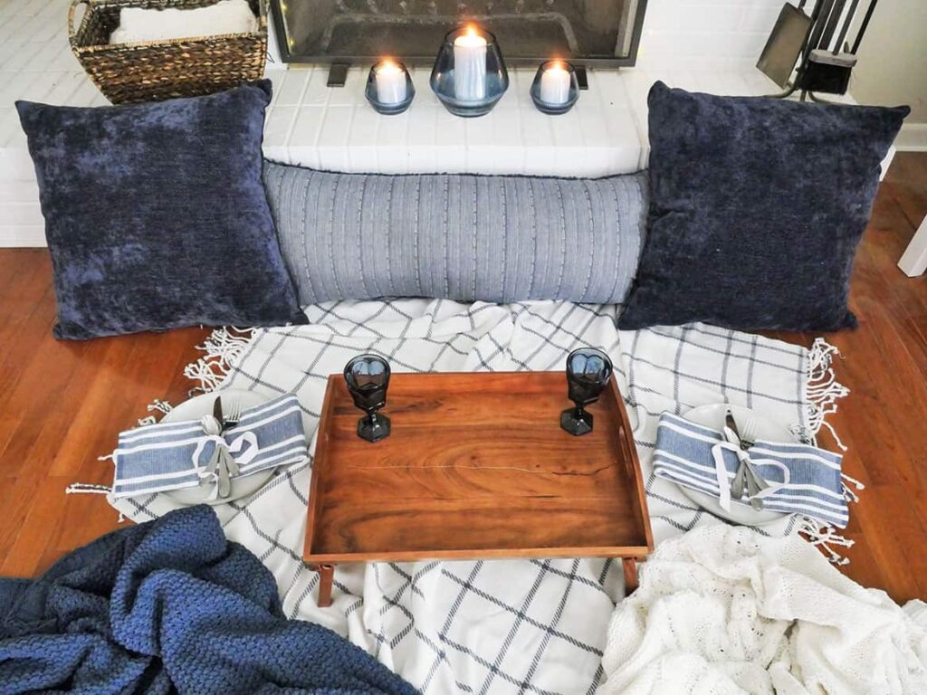 Throw blankets moved to the opposite and of the cozy tablescape