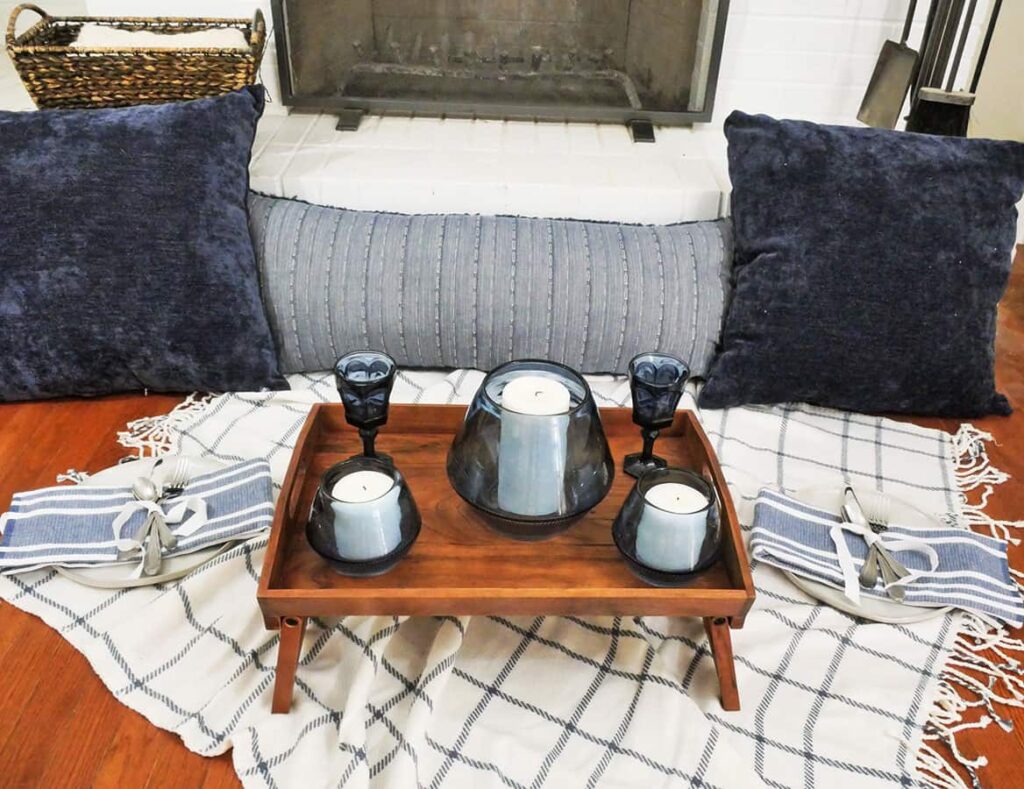 Candle holders added to easy cozy table setting for two