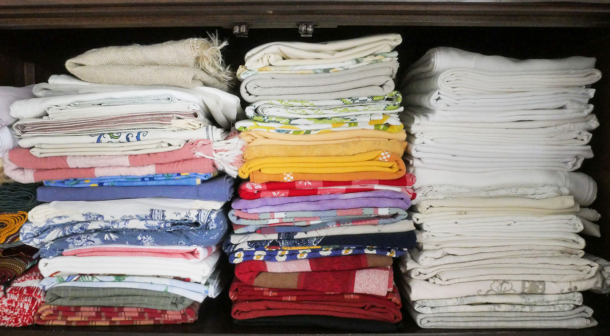 Best way to store tablecloths - stacked on a shelf