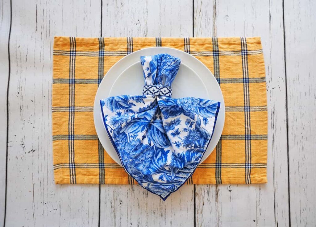 Blue and yellow unique place setting using a white plate