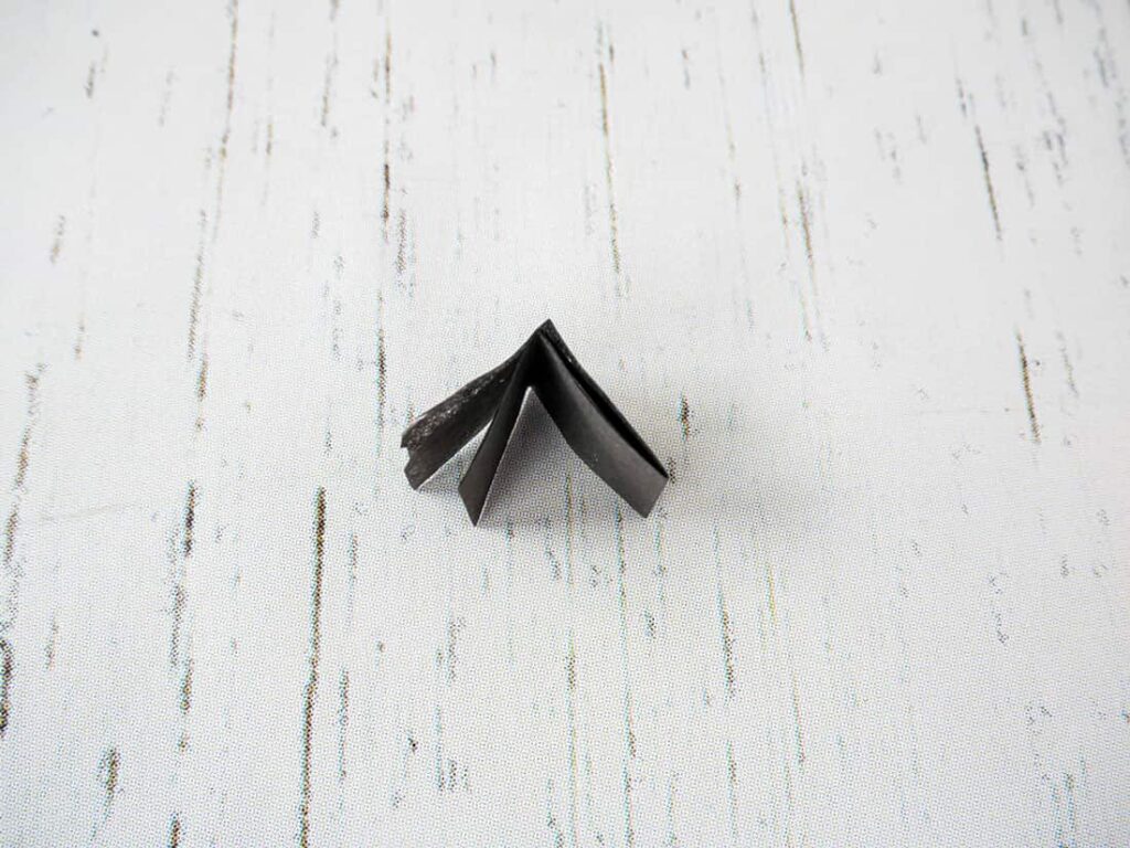 Folded black tissue paper