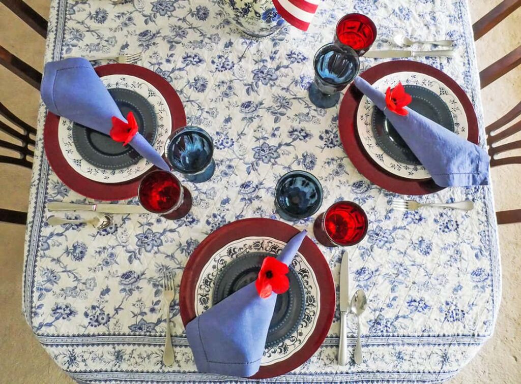 Overhead view of 3 simple Memorial Day tablescape place settings
