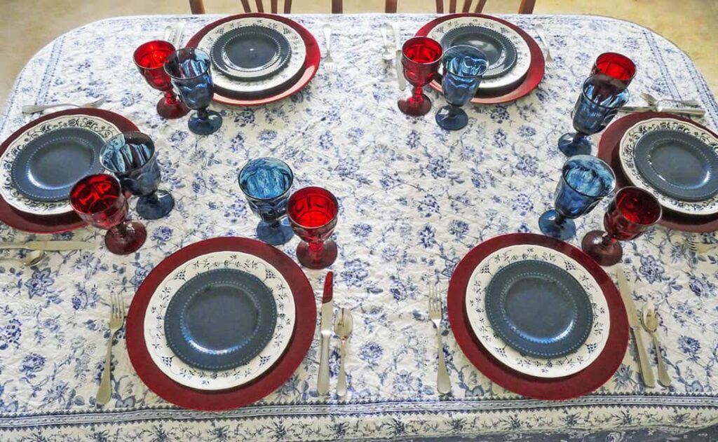 Glasses and silverware added to Memorial Day table setting