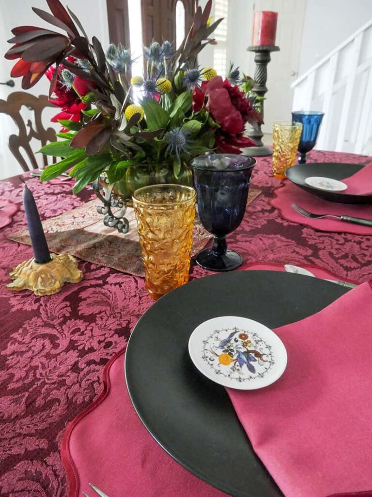 Unique Father's Day table setting with blue and amber glasses