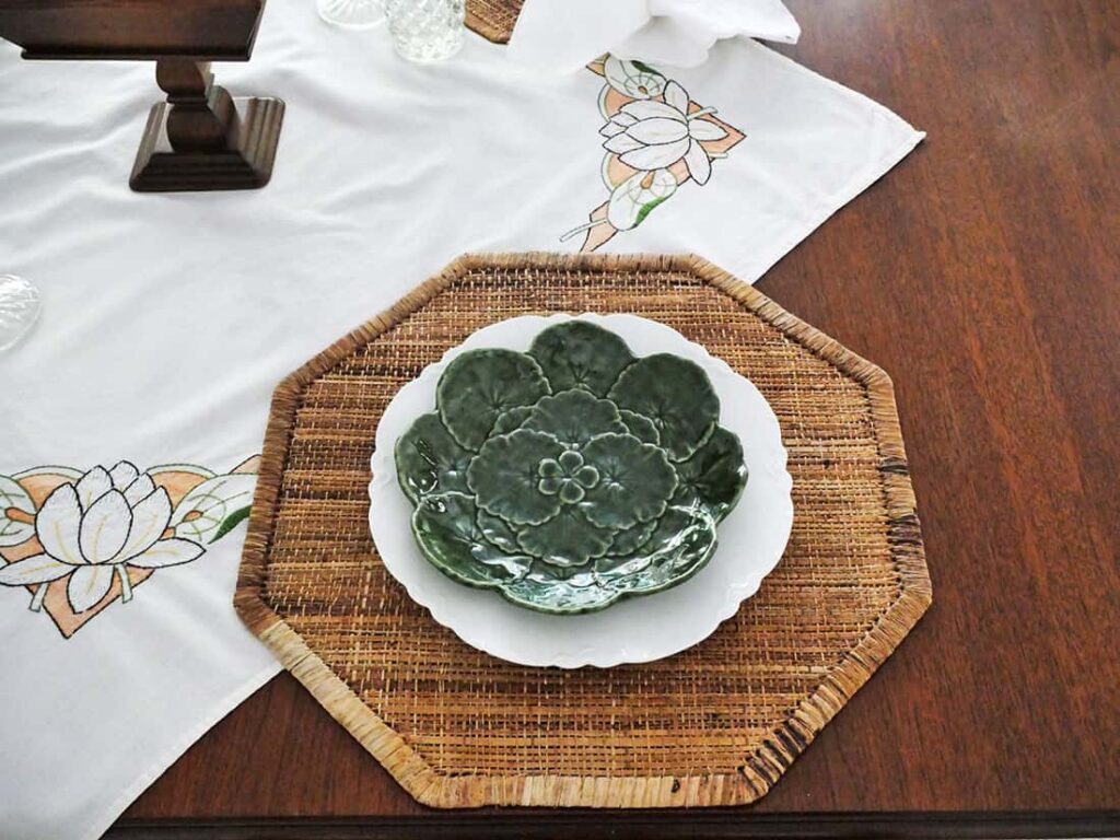 Green salad plate added to white plate