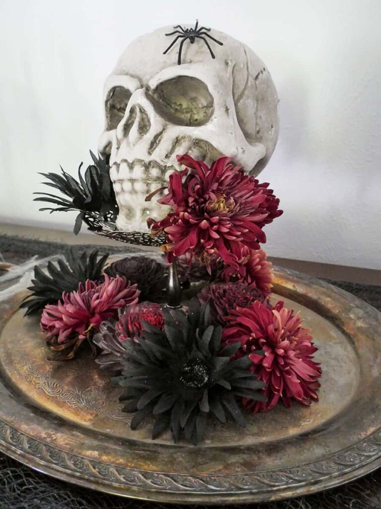 Side view of skull decor on buffet table.