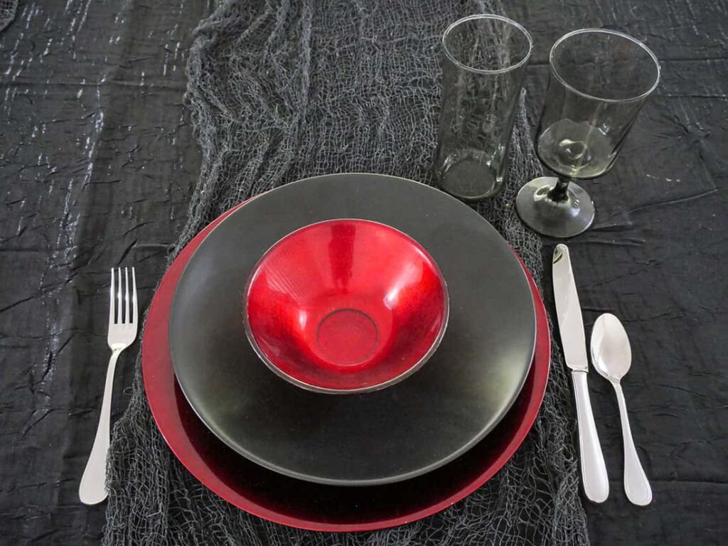 Utensils and glasses added to Halloween place setting.