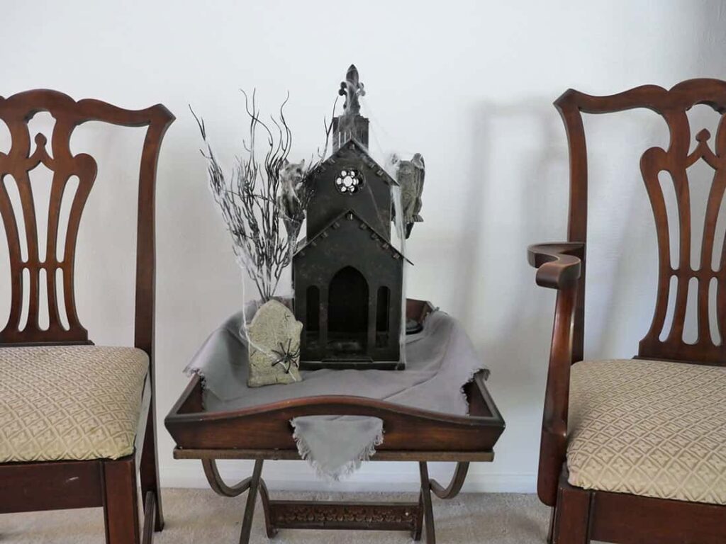 Haunted house on side table.