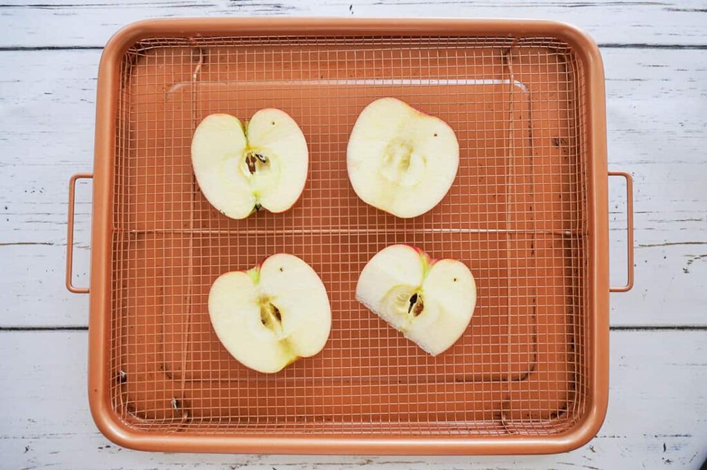 Apple slices on rack.