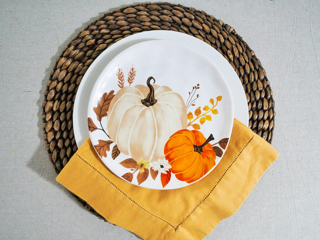 Pumpkin theme place setting idea for Thanksgiving