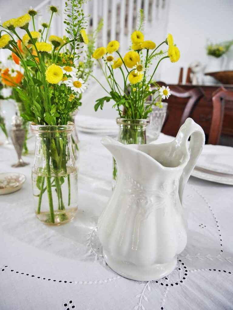 Close up of small pitcher on the table.