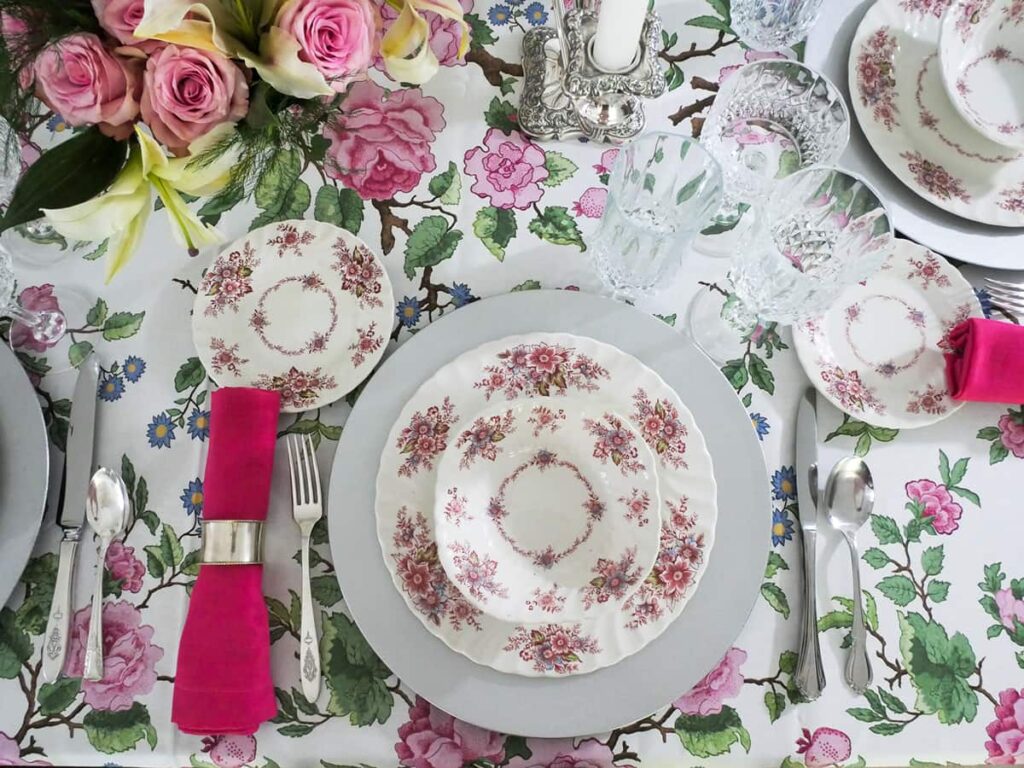 Overhead view of Bridgerton-inspired tablescape place setting.