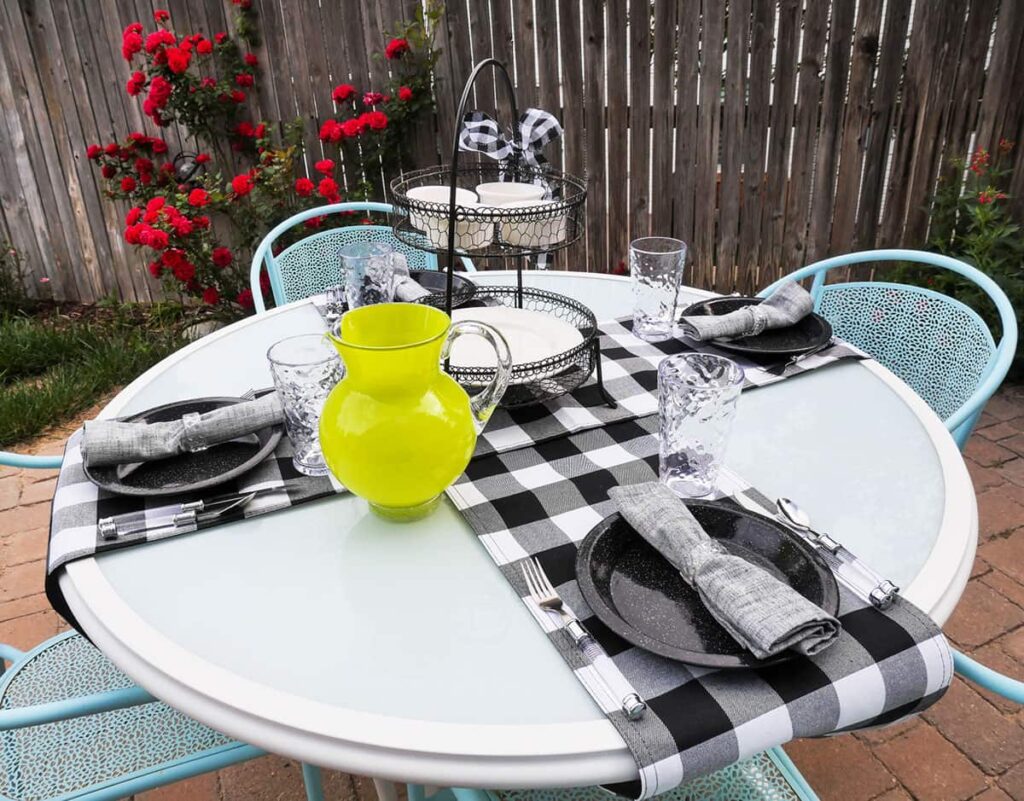 Black and white thrifted ourdoor tablescape.