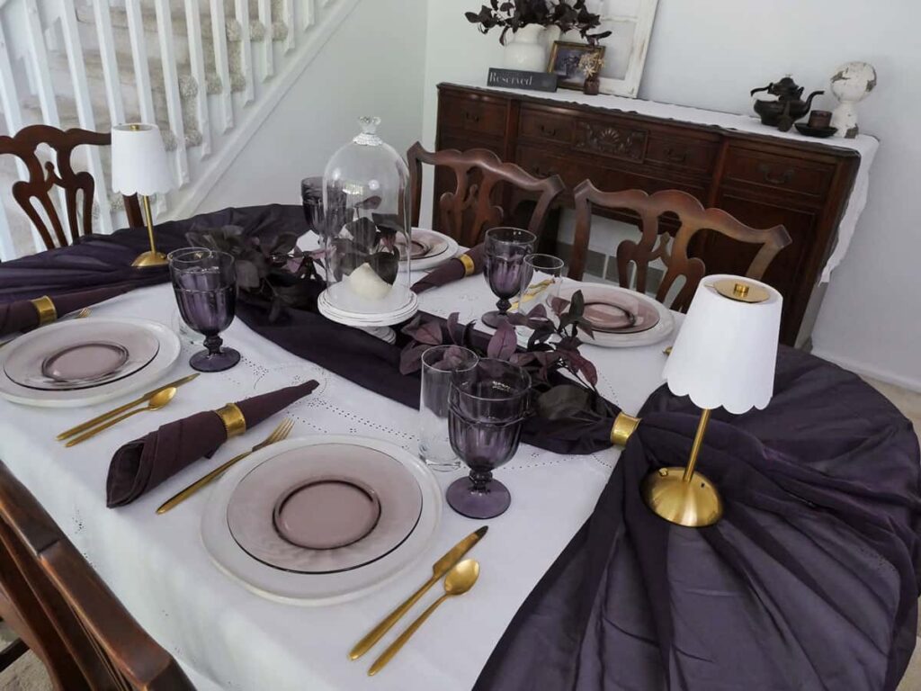 Full view of the unique fall table setting using deep purple as the primary color.