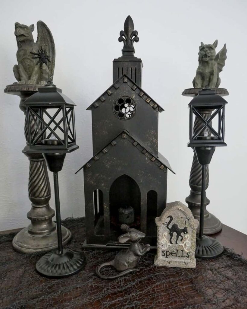 Gargoyles flanking a dark church.