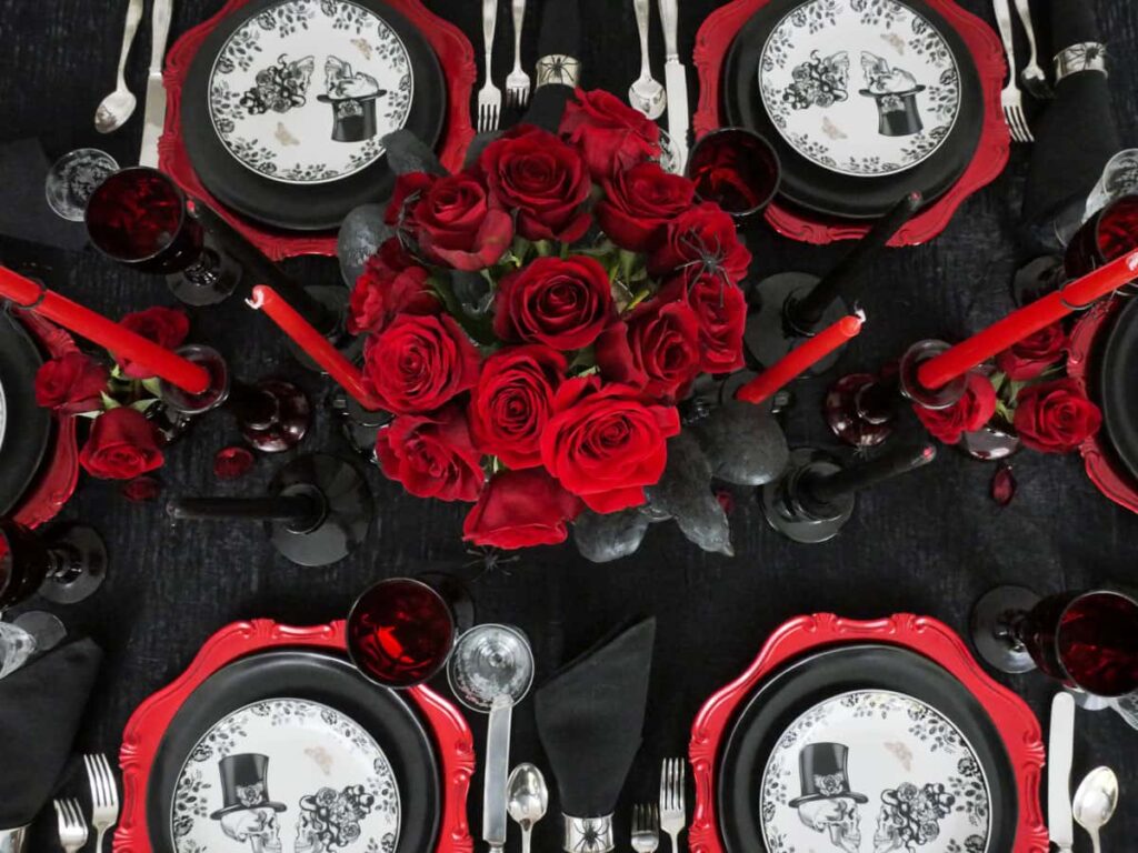 Overhead view of red and black Halloween tablescape.